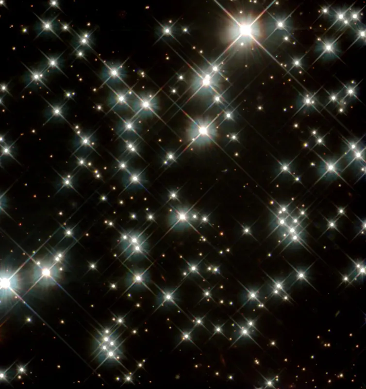 white bright lights on a black background
