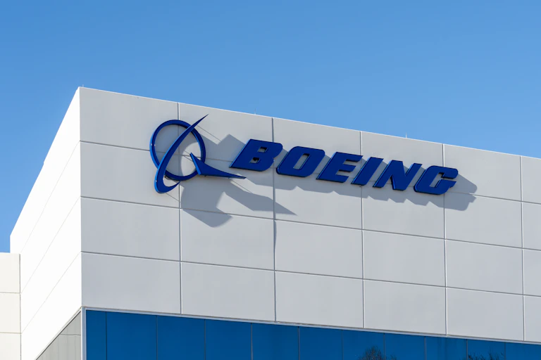 A building with a sign that says 'Boeing' across the front