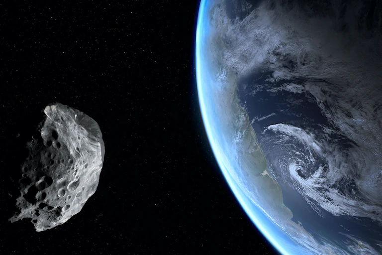ilustração de um asteroide no espaço com parte do globo terrestre ao fundo