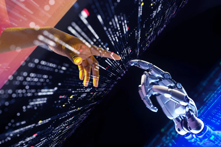 human hand and robot hand touching