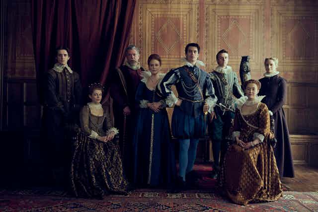 Production image: the family poses for a portrait 