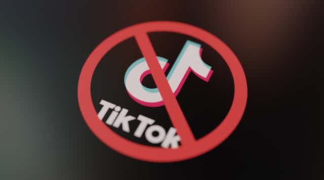 the tiktok logo with a red circle and a line going through it