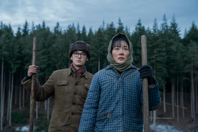 Yang Hewen and Zine Tseng in 3 Body Problem.