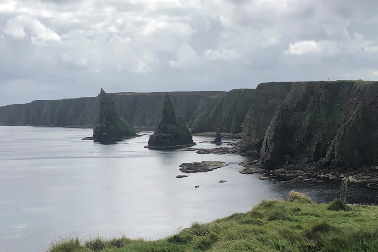 Cilffs on the right, and the sea on the left.