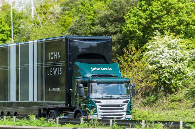 A John Lewis lorry on the road.