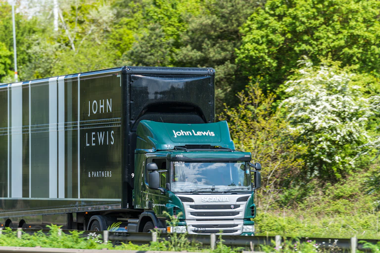 A John Lewis lorry on the road.