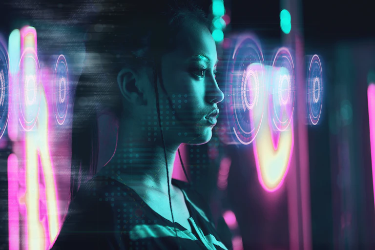 a woman lit by purple and green lights with an overlay of digital circles