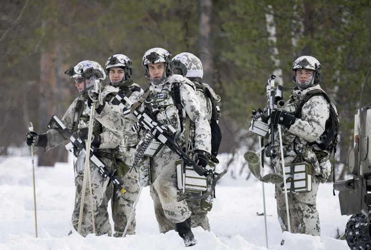 Finnish soldiers in the snow during NATO military exercises