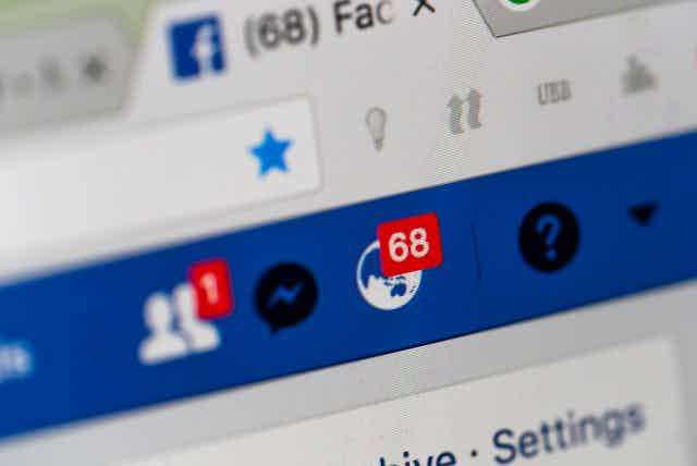 Close-up of a Facebook notification icon showing 68 items.