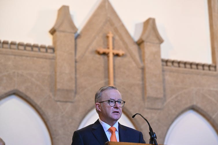 Prime Minister Anthony Albanese speaks in a church.
