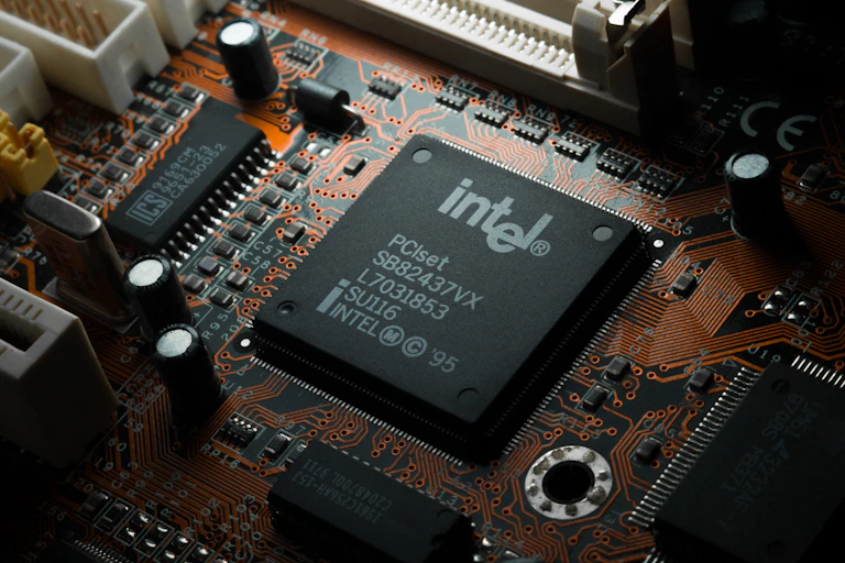 A close up of a computing chip on a computer motherboard