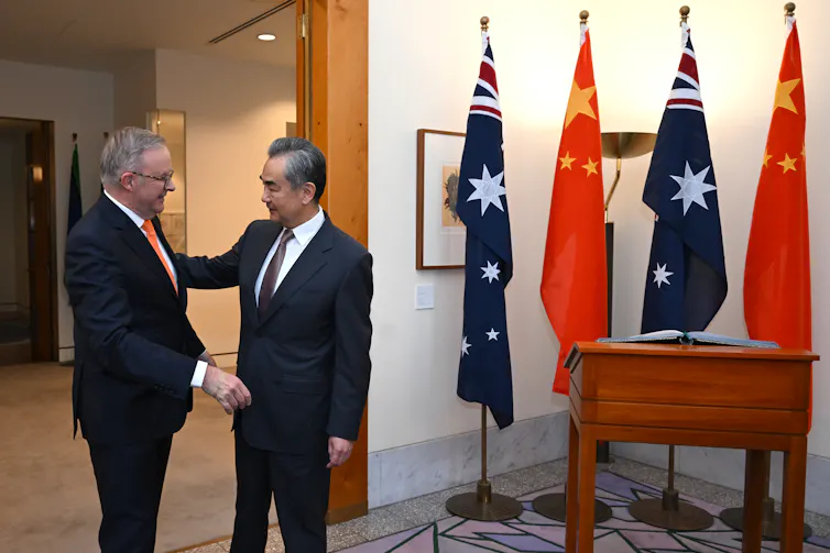 Wang and Albanese chatting