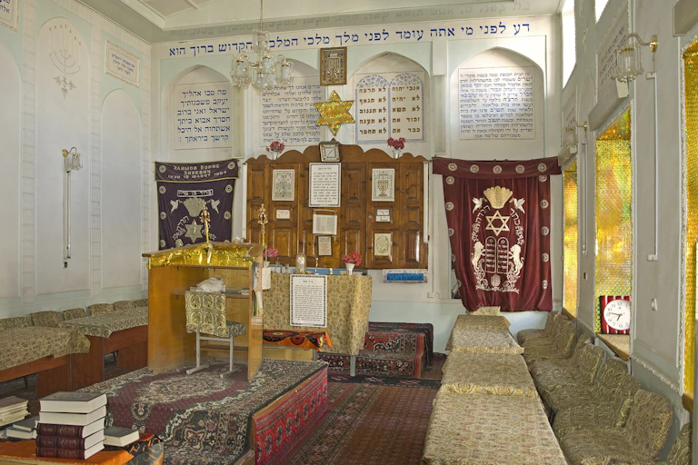 A carpeted interior of a synagogue.