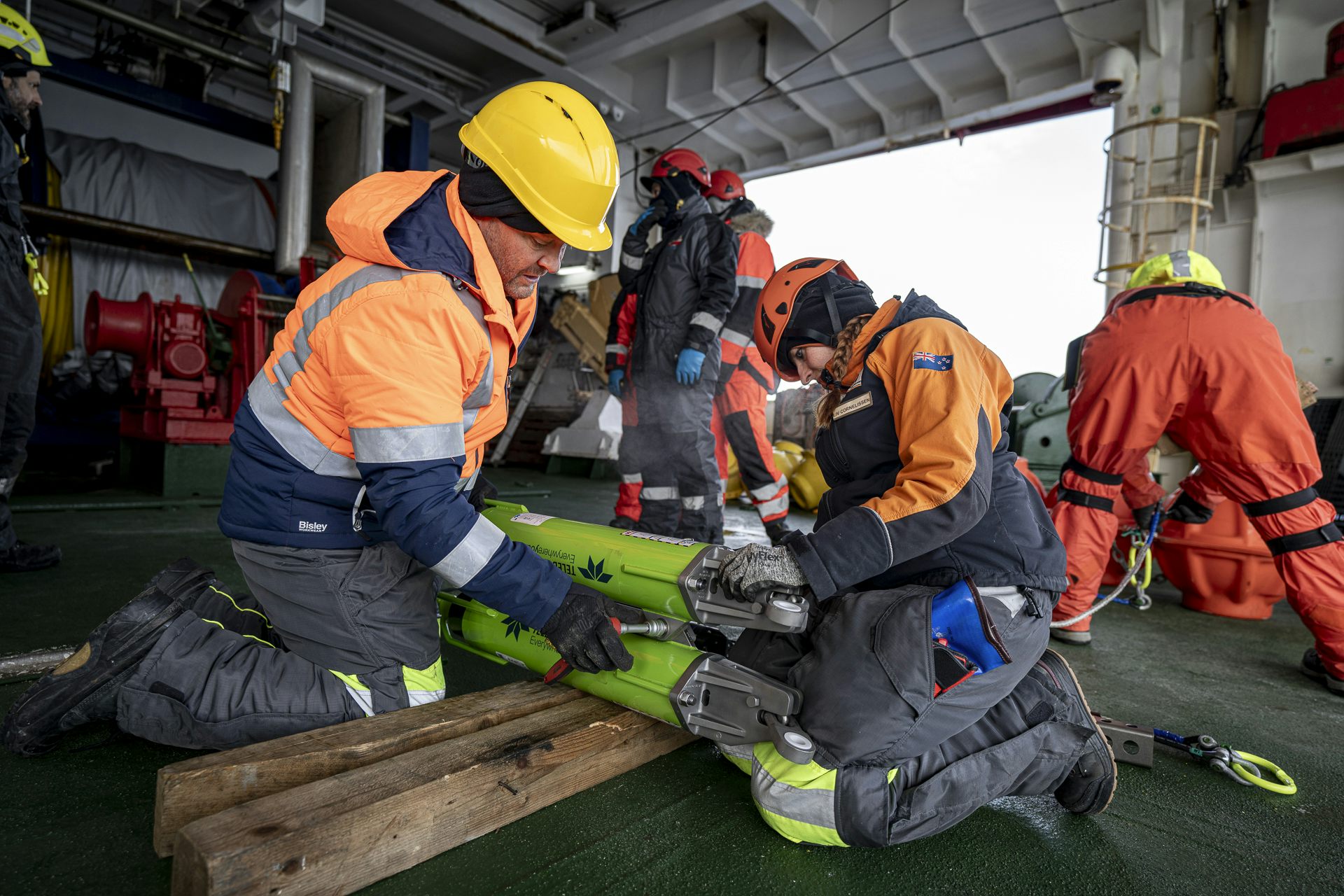 Marine scientists preparing a mooring on the deck of the RV Laura Bassi during a voyage of the Ross Sea