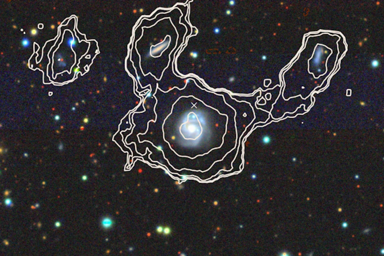 A photo of stars against a black background, with white contour lines drawn around some.