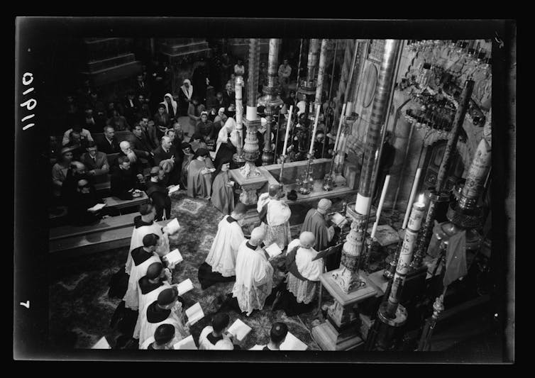 A black and white nitrate negative image of a church service in 1941.