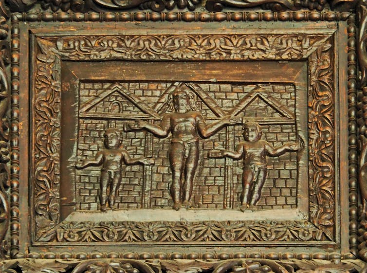 Panel from church door showing Jesus crucified