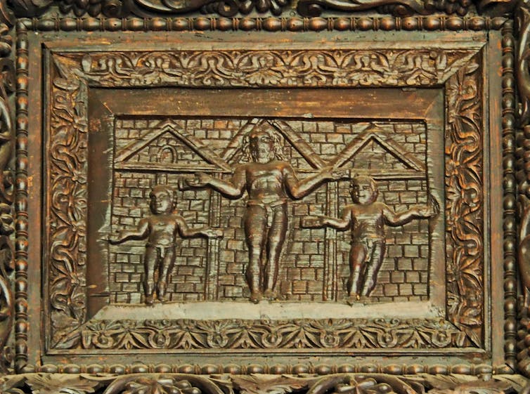Panel from church door showing Jesus crucified