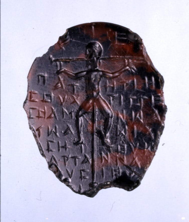 ancient gemstone depicting Jesus crucified