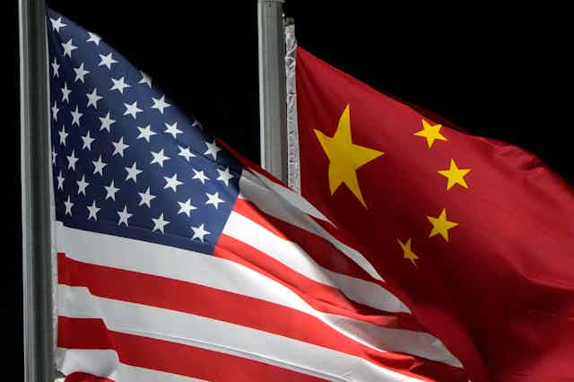 the US and People's Republic of China flags