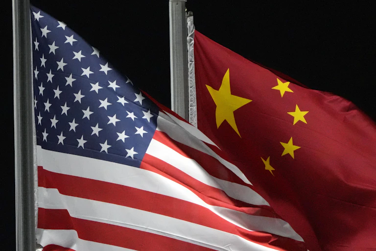 the US and People's Republic of China flags