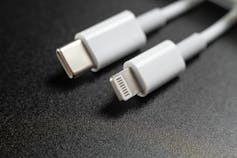 An appple lightning connector and a USB C connector