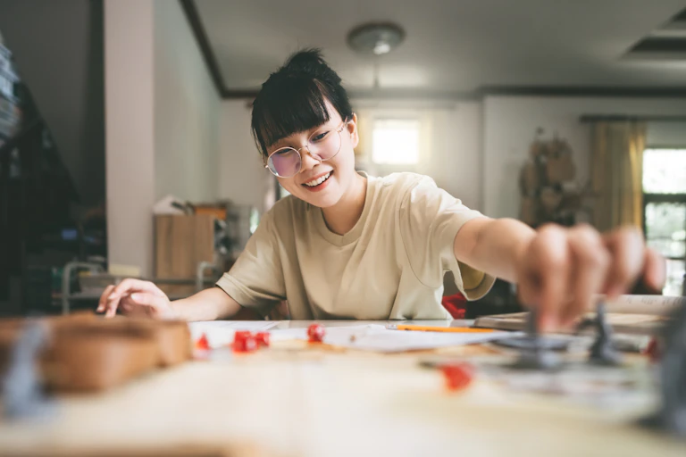 young woman playing Dungeons and Dragons