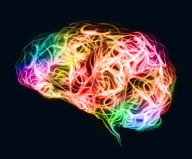 Colorful brain waves on black background