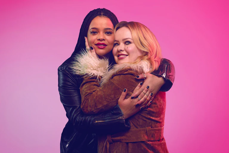 Lydia West and Nicola Coughlan embracing