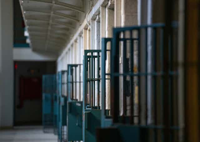 A row of open prison doors
