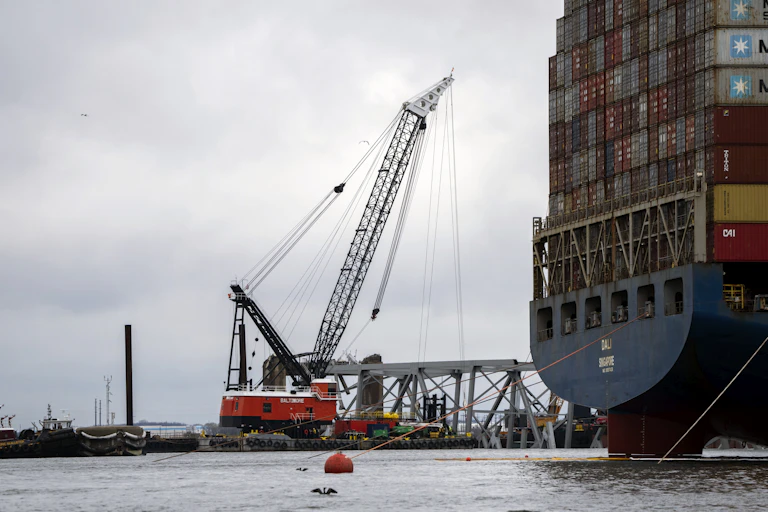 two vessels near a collapsed bridge