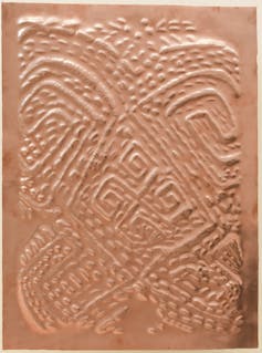 Ritualistic scarification engraved on copper basreliefs
