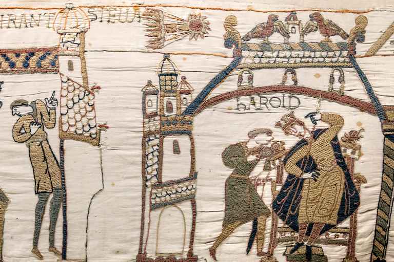 A scene from the Bayeux tapestry.