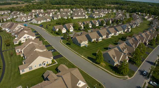 A bird's-eye view of a relatively new suburban neighborhood.