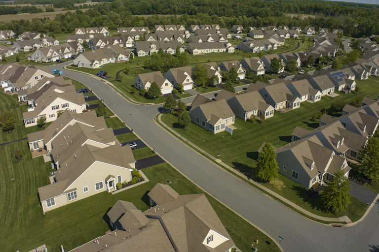 A bird's-eye view of a relatively new suburban neighborhood.