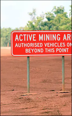 Photo of sign that says: Active Mining Area.