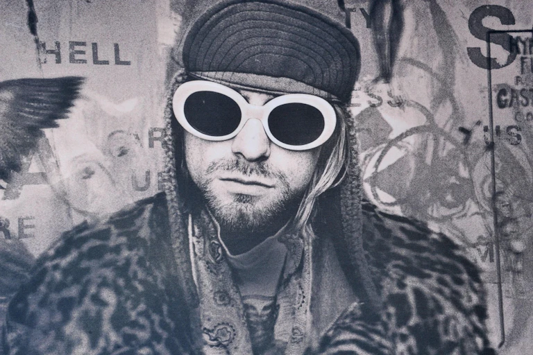 Kurt Cobain in his now-iconic white sunglasses.
