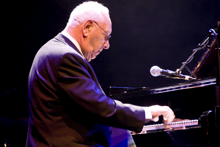 A man plays the piano