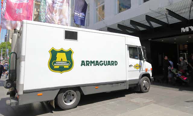 Armaguard currency transport vehicle parked on Bourke Street Mall in Melbourne