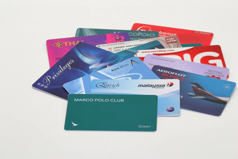 A stack of frequent flyer cards from a range of different airlinesv
