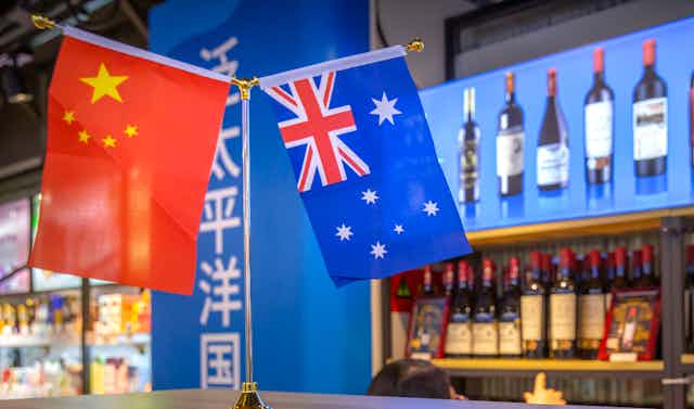 small Australian and Chinese flags displayed in a wine shop in China