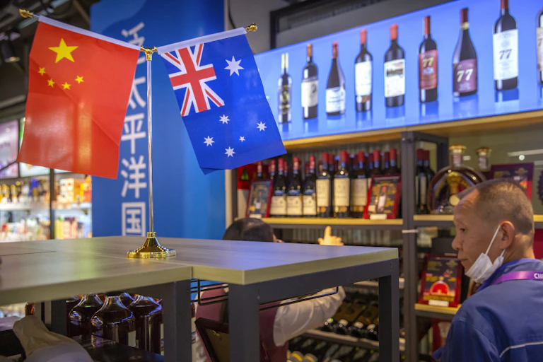 small Australian and Chinese flags displayed in a wine shop in China