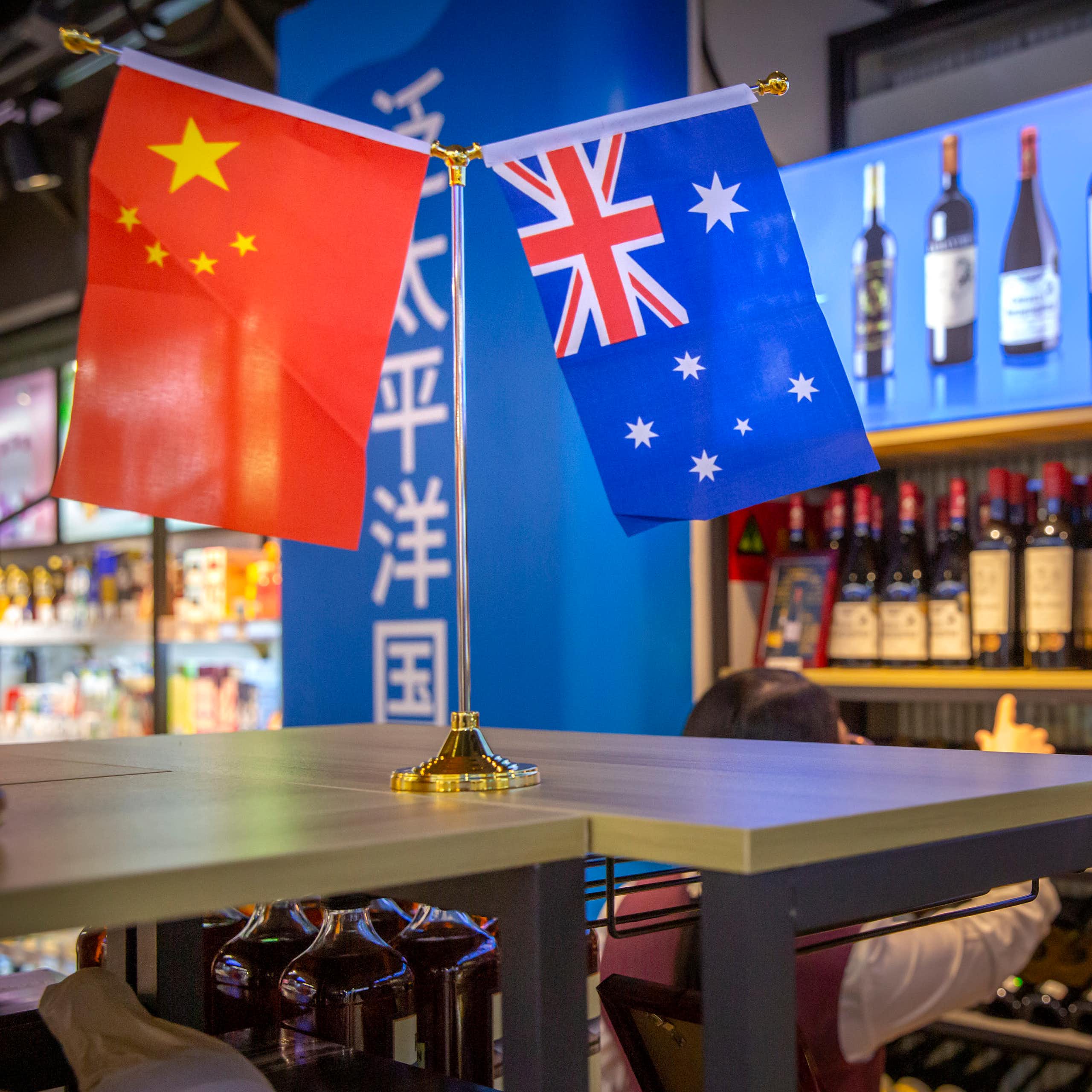 small Australian and Chinese flags displayed in a wine shop in China
