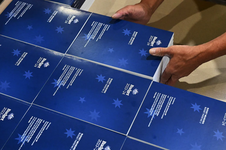 Photo of 2023-2024 Budget Papers at a printing facility prior to being delivered to Parliament House