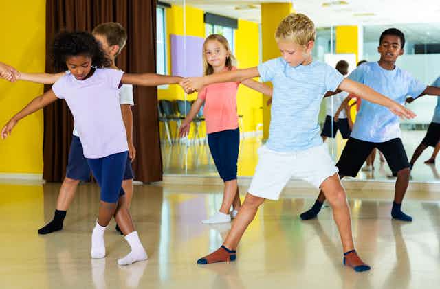 children in PE dance class