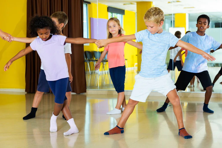 children in PE dance class