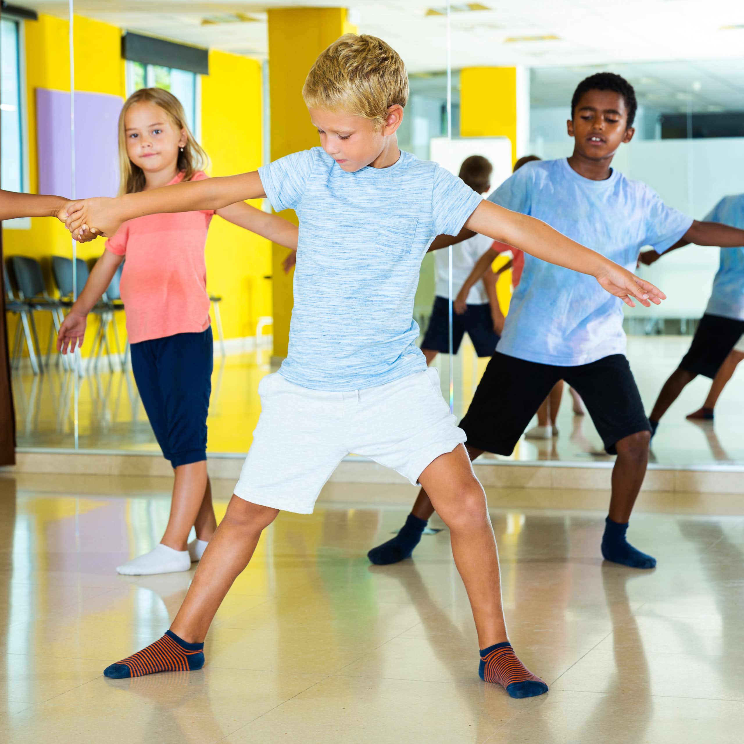children in PE dance class