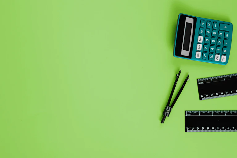 A calculator, compass and ruler.