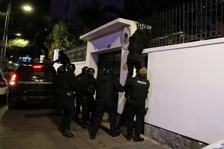 Ecuadorian security forces breaking into the Mexican embassy in the capital, Quito, on April 5 2024.