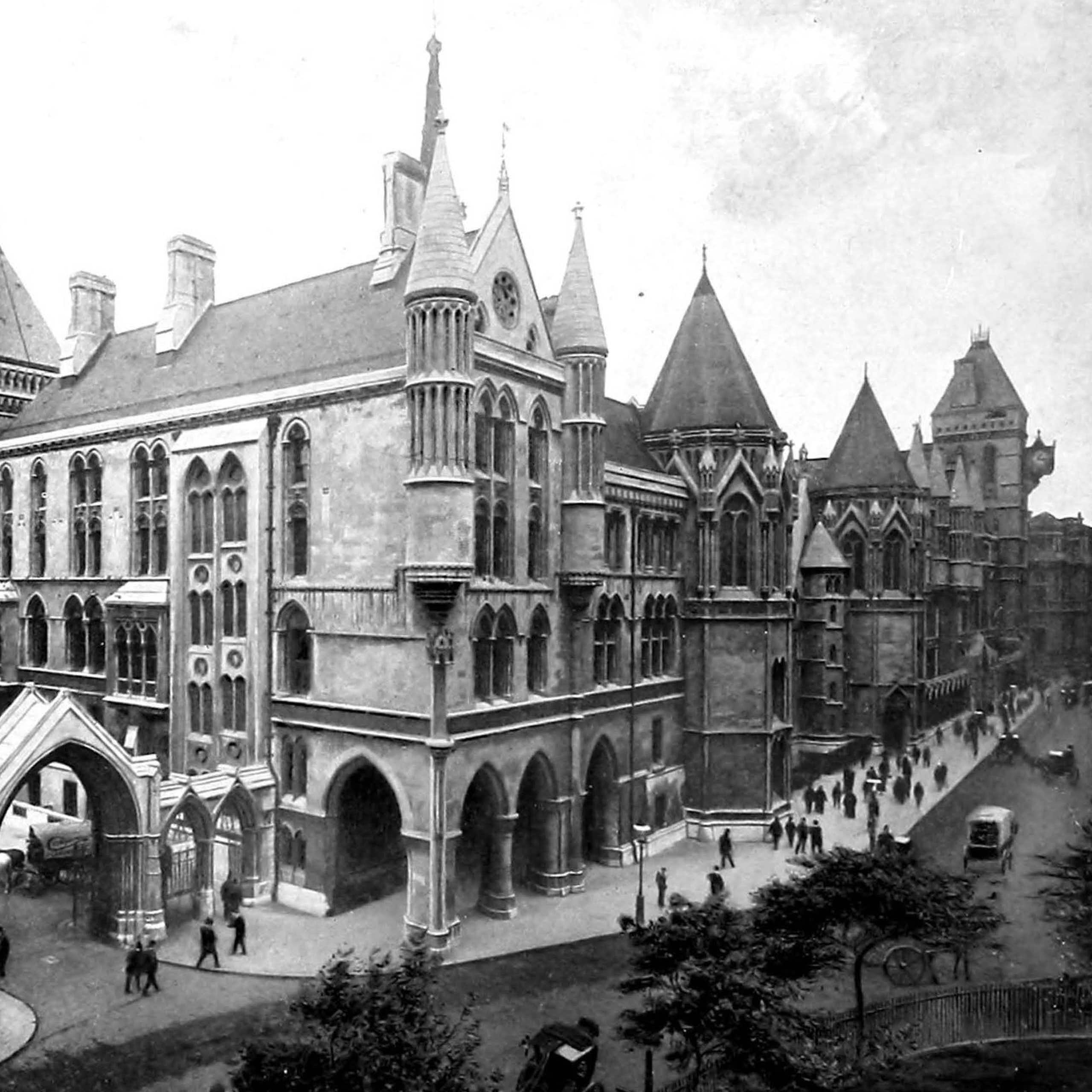 An archival photograph in black and white of a Victorian building complex.